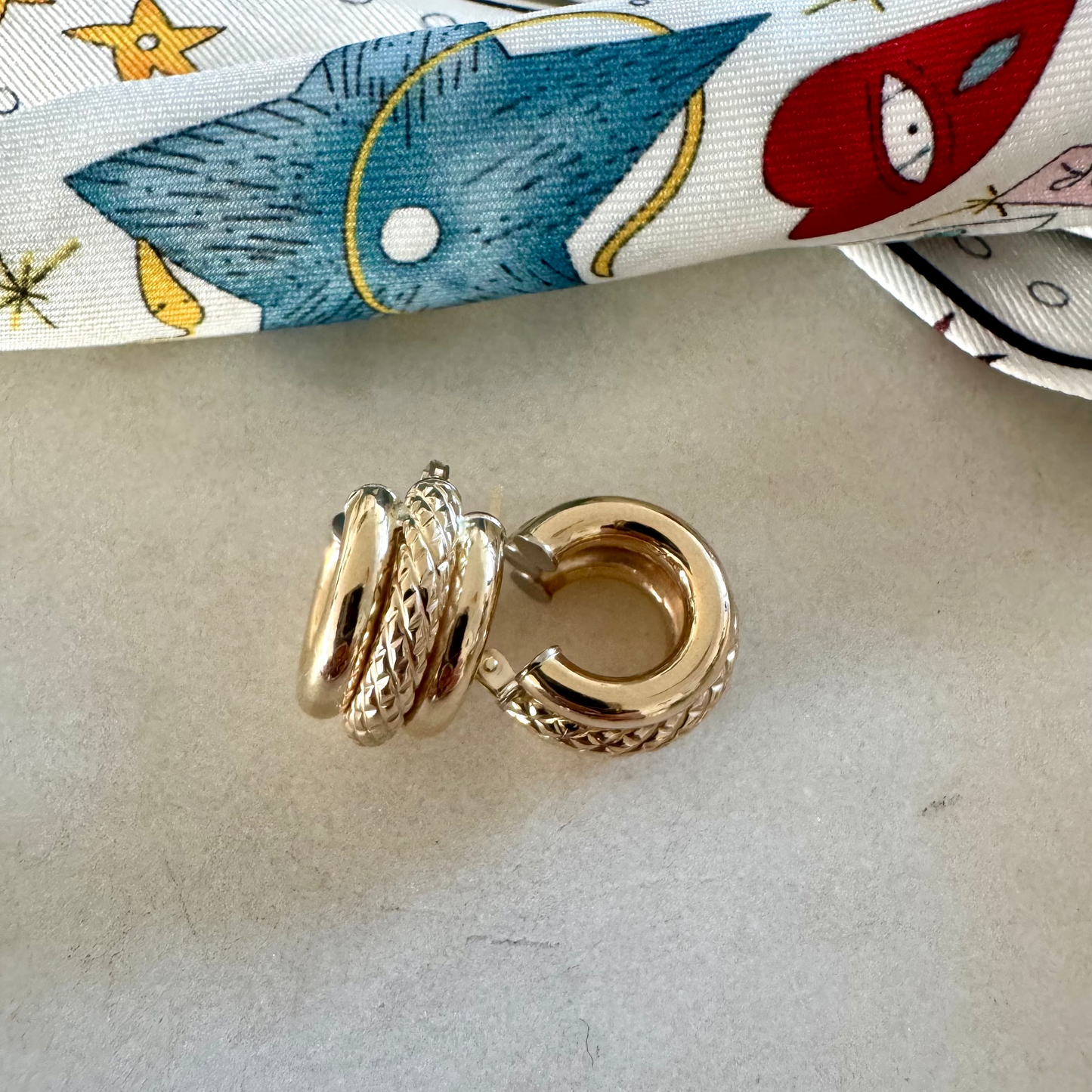 Vintage Italian Unoaerre triple SMALL (but thick) hoops.
