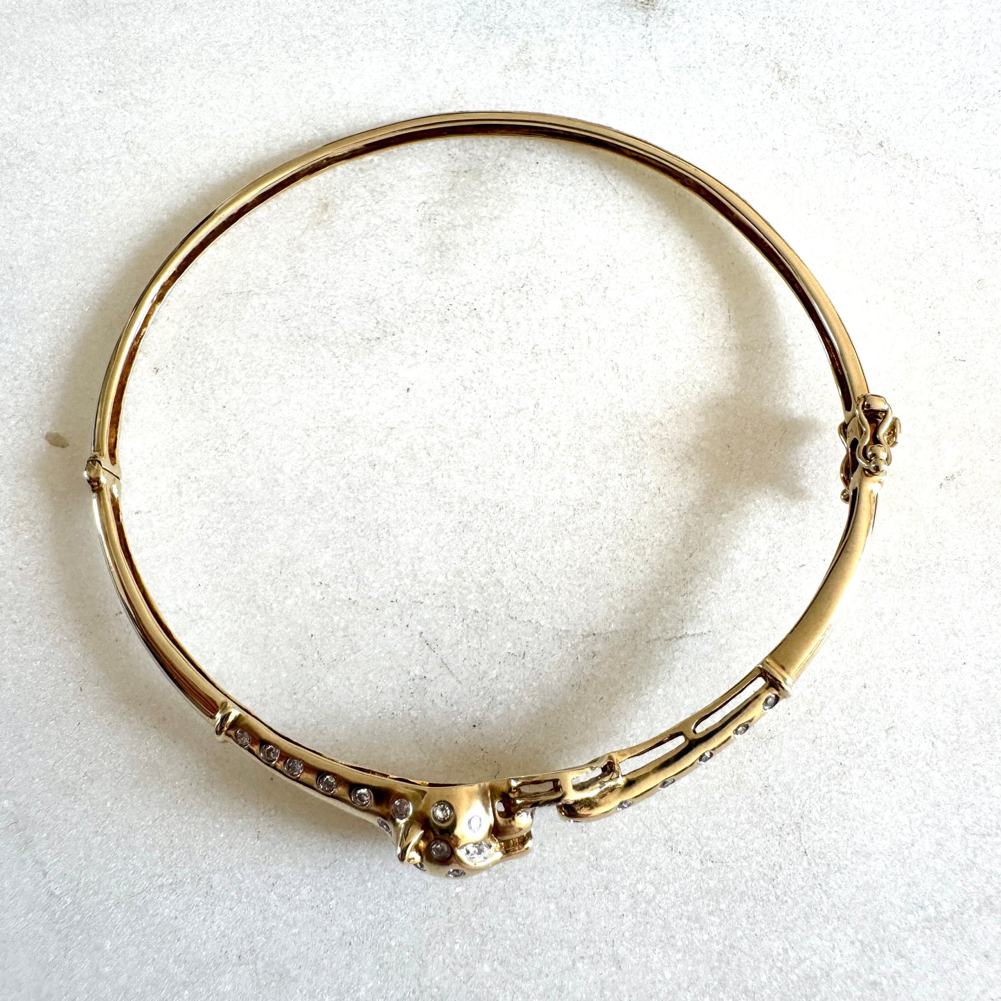SHOW STOPPER! 9ct gold and diamond hinged panther bangle
