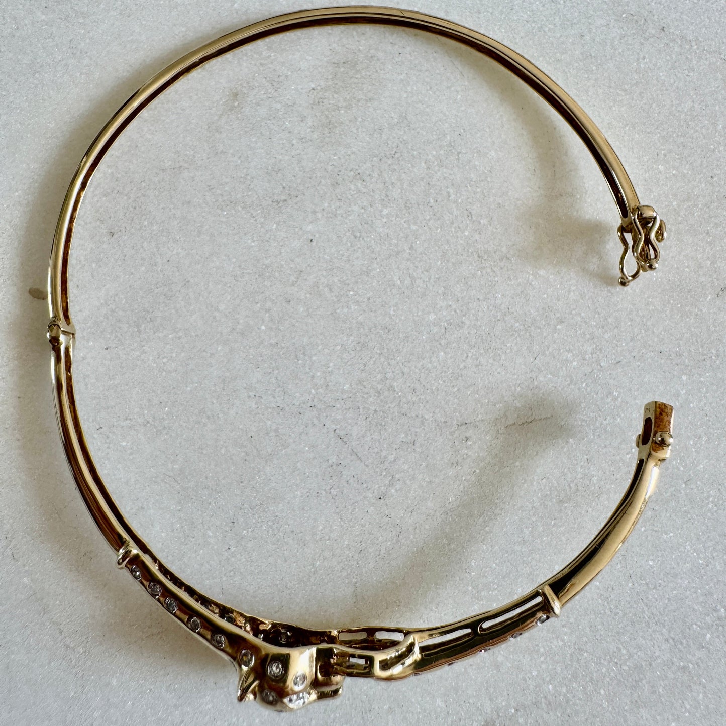 SHOW STOPPER! 9ct gold and diamond hinged panther bangle