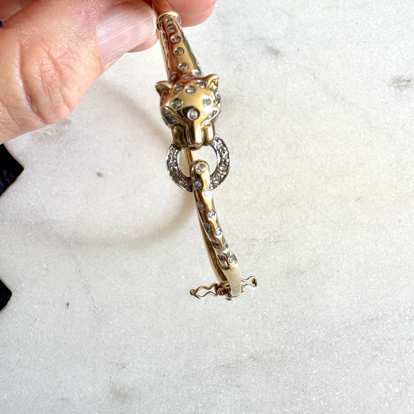 SHOW STOPPER! 9ct gold and diamond hinged panther bangle