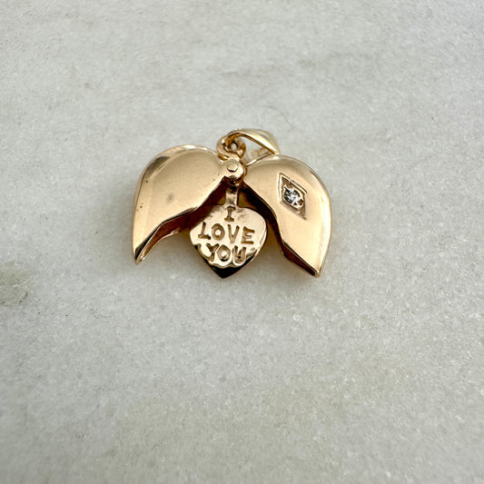 Super special 9ct articulated heart pendant with a hidden message!!