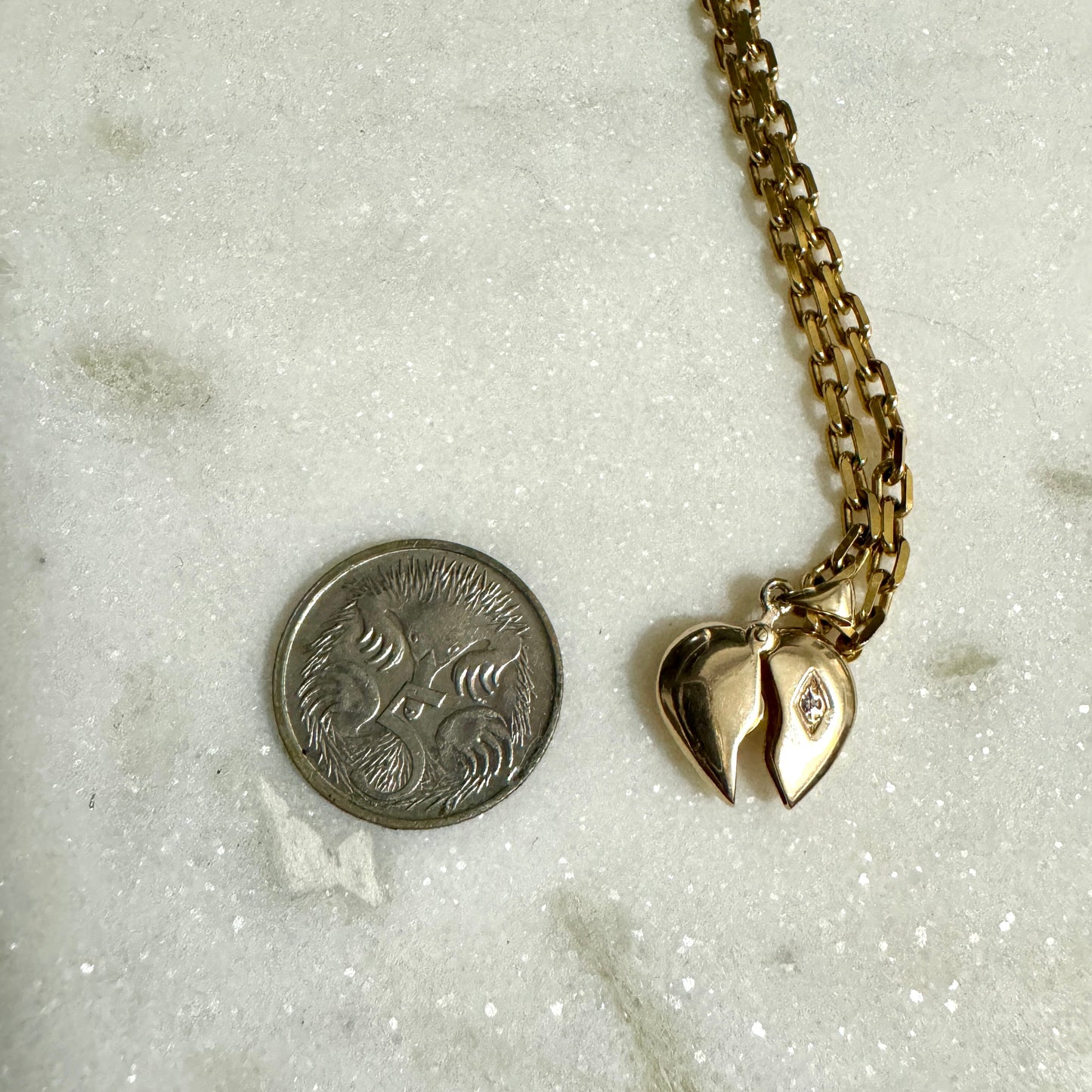 Super special 9ct articulated heart pendant with a hidden message!!