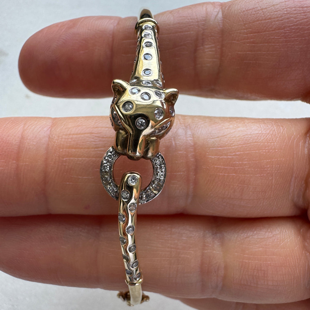 SHOW STOPPER! 9ct gold and diamond hinged panther bangle - collectable