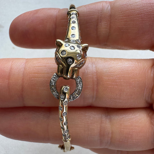 SHOW STOPPER! 9ct gold and diamond hinged panther bangle - collectable