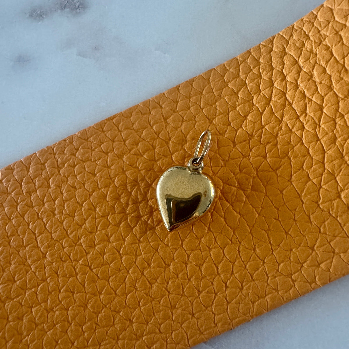 Small but mighty 9ct puffy heart pendant