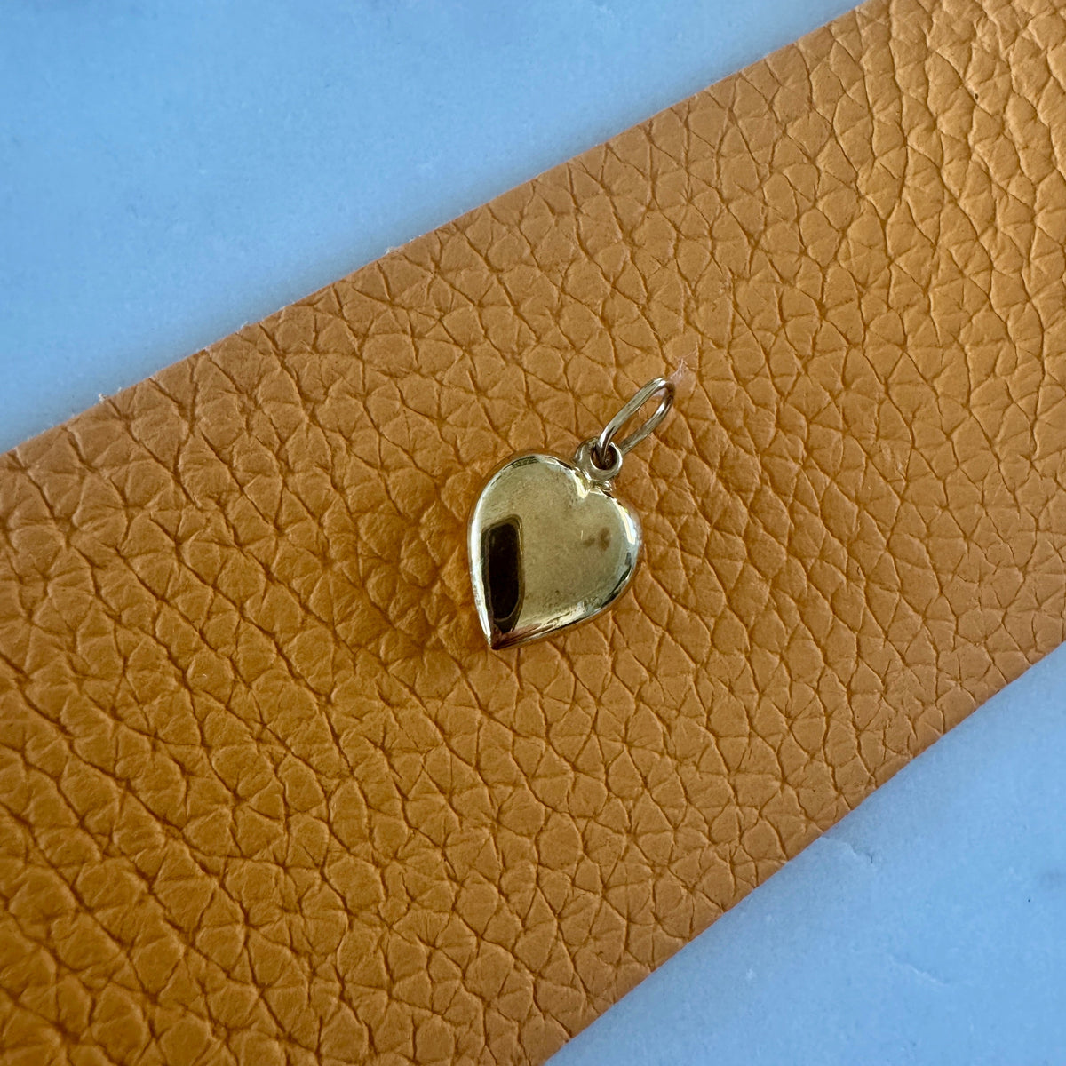 Small but mighty 9ct puffy heart pendant
