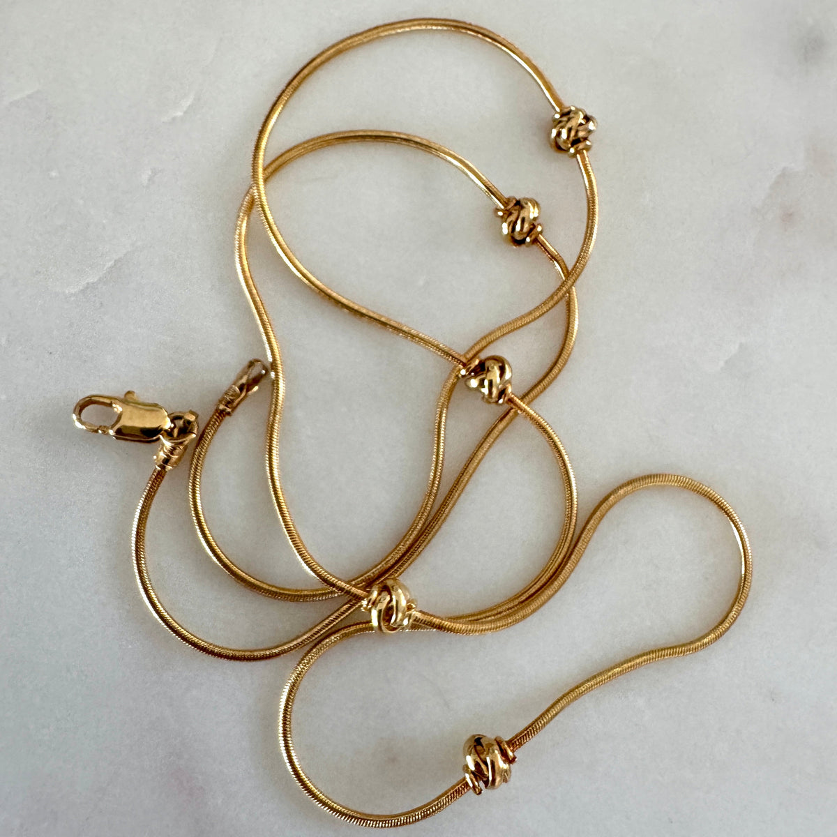 Rosy 'old gold' Unoaerre snake necklace with knots - just breathtaking! For collectors!
