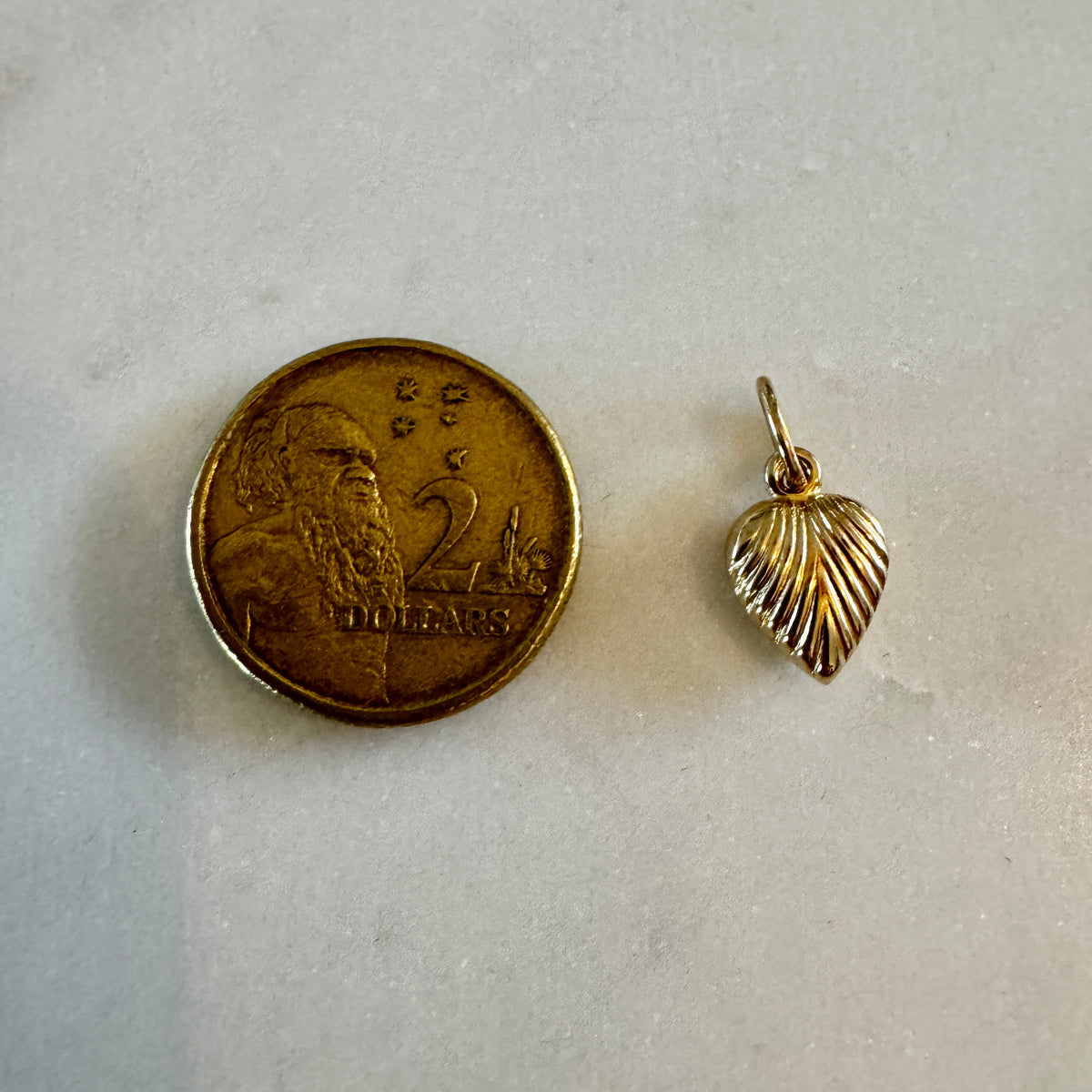 Small sunray 9ct puffy heart pendant