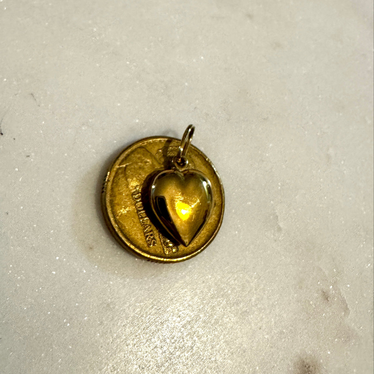 Small but mighty 9ct puffy heart pendant
