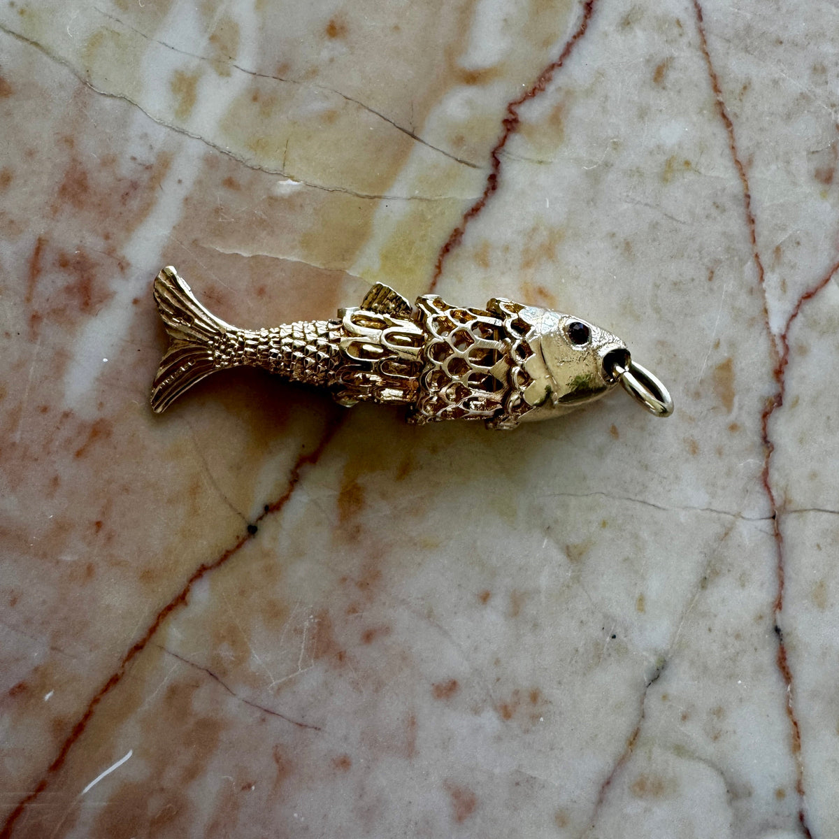 9ct 'old gold' articulated fish - full British hallmarks with garnet eyes! Collectable!