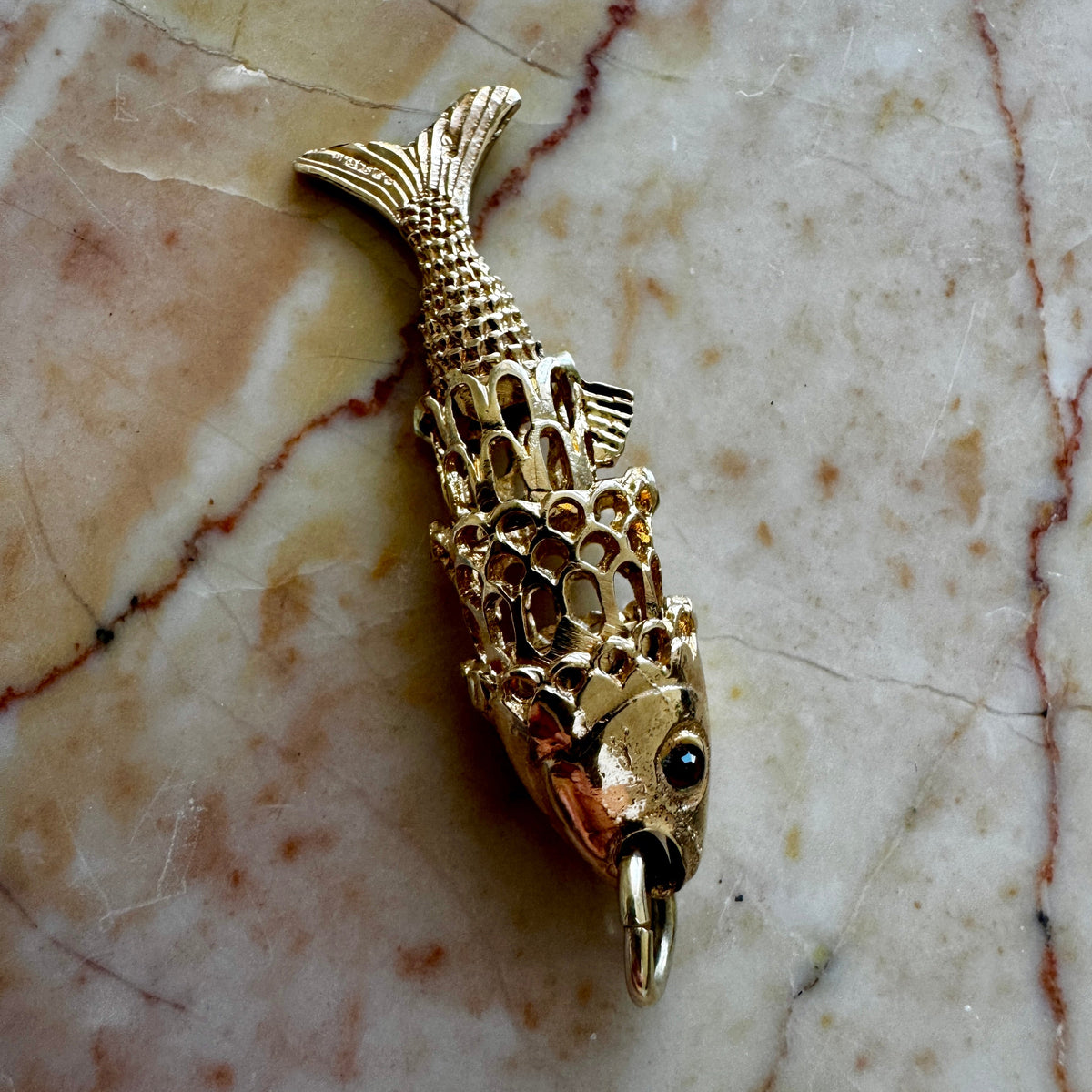 9ct 'old gold' articulated fish - full British hallmarks with garnet eyes! Collectable!