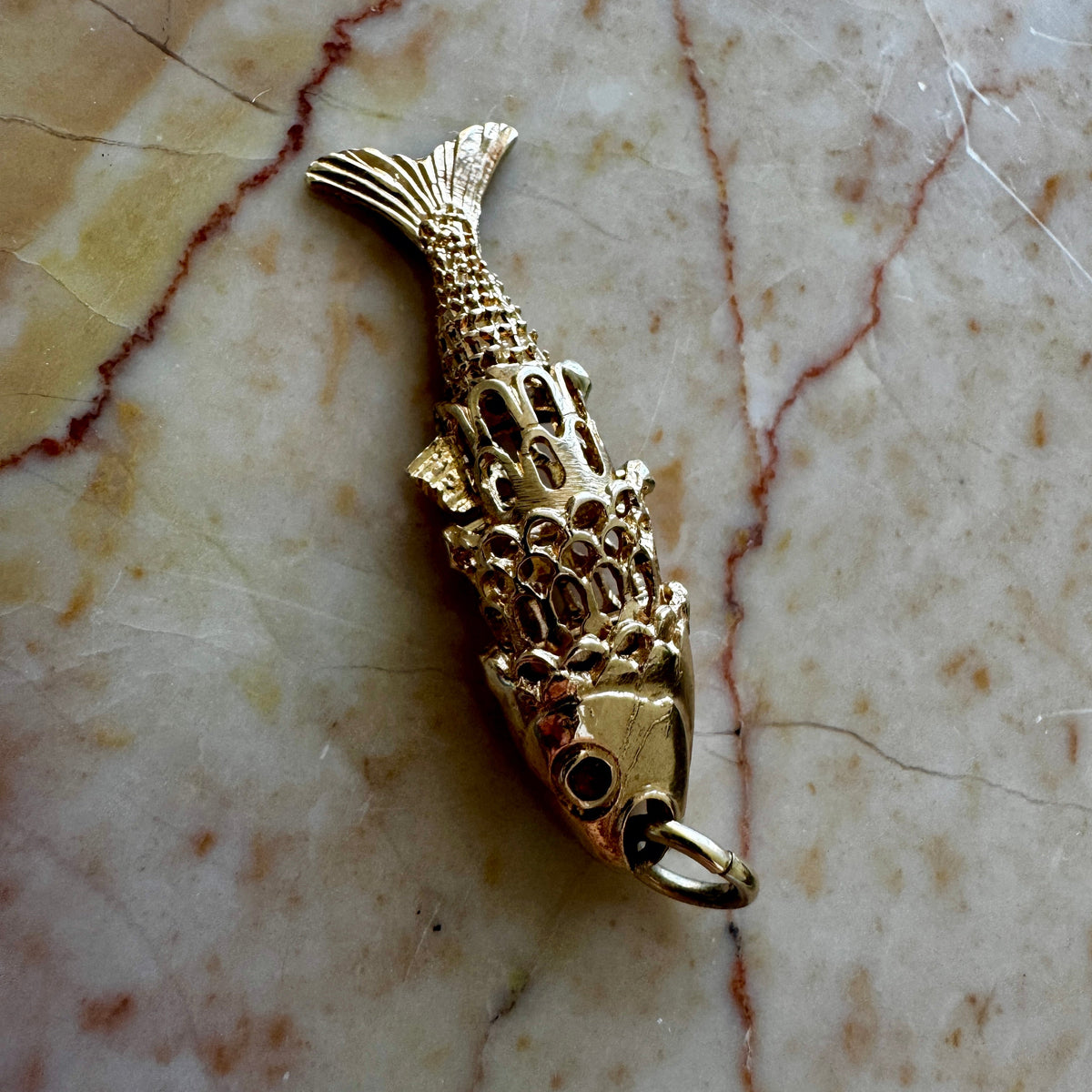 9ct 'old gold' articulated fish - full British hallmarks with garnet eyes! Collectable!